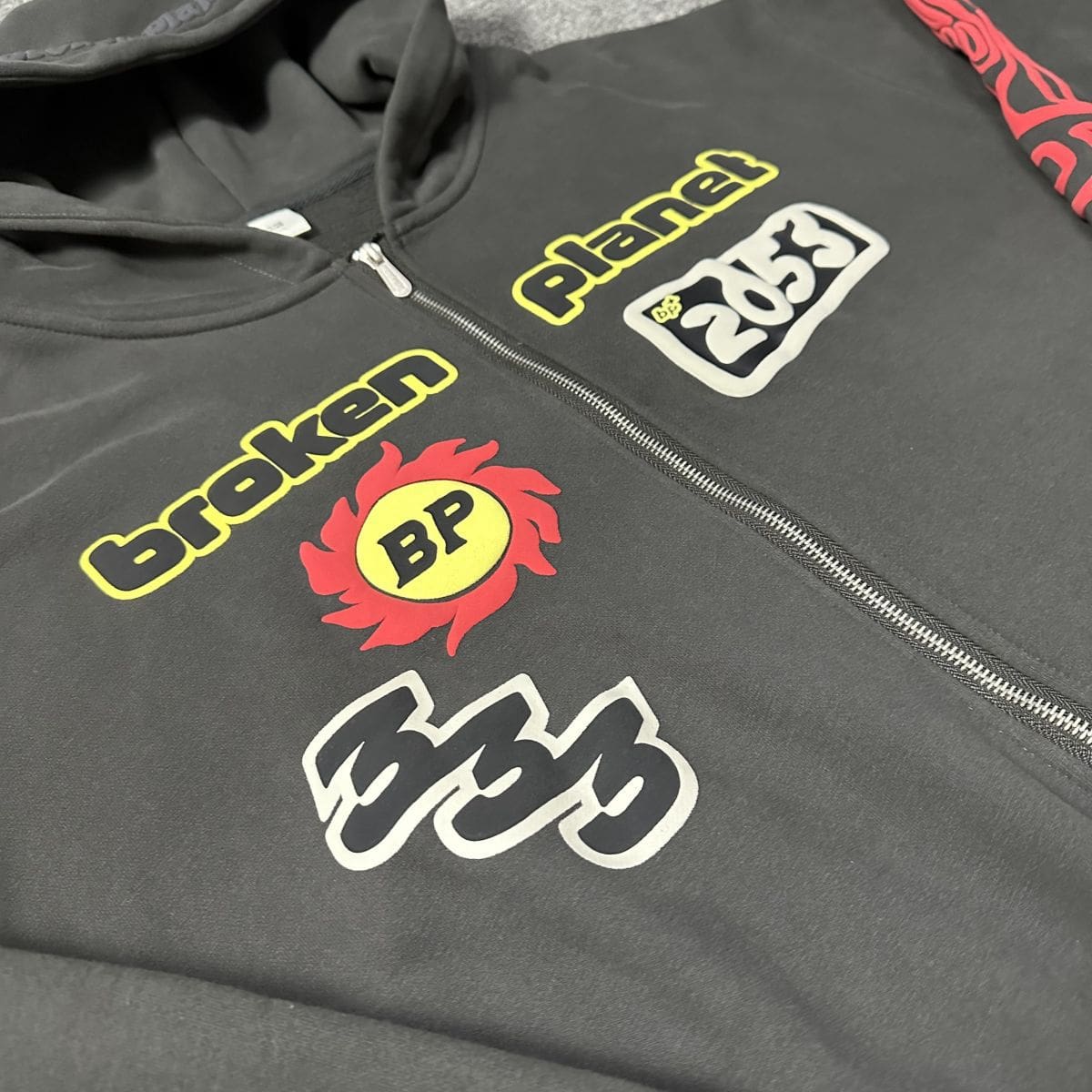 Broken Planet Puff Print Zipper Sweater and Casual Trousers